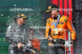 Race winner Oscar Piastri (AUS) McLaren celebrates on the podium with third placed Lewis Hamilton (GBR) Mercedes AMG F1. 21.07.2024. Formula 1 World Championship, Rd 13, Hungarian Grand Prix, Budapest, Hungary, Race Day.