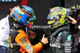 (L to R): Race winner Oscar Piastri (AUS) McLaren celebrates with third placed Lewis Hamilton (GBR) Mercedes AMG F1 in parc ferme. 21.07.2024. Formula 1 World Championship, Rd 13, Hungarian Grand Prix, Budapest, Hungary, Race Day.