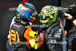 (L to R): Race winner Oscar Piastri (AUS) McLaren celebrates with third placed Lewis Hamilton (GBR) Mercedes AMG F1 in parc ferme. 21.07.2024. Formula 1 World Championship, Rd 13, Hungarian Grand Prix, Budapest, Hungary, Race Day.