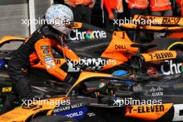 Rew Oscar Piastri (AUS) McLaren MCL38 celebrates with second placed team mate Lando Norris (GBR) McLaren MCL38 in parc ferme. 21.07.2024. Formula 1 World Championship, Rd 13, Hungarian Grand Prix, Budapest, Hungary, Race Day.
