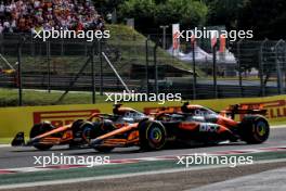 Race winner Oscar Piastri (AUS) McLaren MCL38 and Lando Norris (GBR) McLaren MCL38 at the end of the race. 21.07.2024. Formula 1 World Championship, Rd 13, Hungarian Grand Prix, Budapest, Hungary, Race Day.