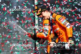 Race winner Oscar Piastri (AUS) McLaren celebrates on the podium with team mate Lando Norris (GBR) McLaren. 21.07.2024. Formula 1 World Championship, Rd 13, Hungarian Grand Prix, Budapest, Hungary, Race Day.