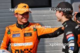 (L to R): Second placed Lando Norris (GBR) McLaren with race winner and team mate Oscar Piastri (AUS) McLaren in parc ferme. 21.07.2024. Formula 1 World Championship, Rd 13, Hungarian Grand Prix, Budapest, Hungary, Race Day.