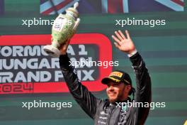 Lewis Hamilton (GBR) Mercedes AMG F1 celebrates his third position on the podium. 21.07.2024. Formula 1 World Championship, Rd 13, Hungarian Grand Prix, Budapest, Hungary, Race Day.