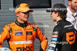 (L to R): Second placed Lando Norris (GBR) McLaren with race winner and team mate Oscar Piastri (AUS) McLaren in parc ferme. 21.07.2024. Formula 1 World Championship, Rd 13, Hungarian Grand Prix, Budapest, Hungary, Race Day.