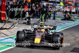 Sergio Perez (MEX) Red Bull Racing RB20 leaves the pits. 21.07.2024. Formula 1 World Championship, Rd 13, Hungarian Grand Prix, Budapest, Hungary, Race Day.