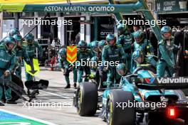 Fernando Alonso (ESP) Aston Martin F1 Team AMR24 makes a pit stop. 21.07.2024. Formula 1 World Championship, Rd 13, Hungarian Grand Prix, Budapest, Hungary, Race Day.