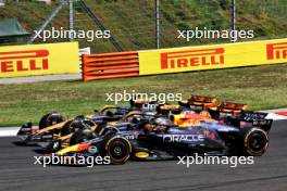 Max Verstappen (NLD) Red Bull Racing RB20; Lando Norris (GBR) McLaren MCL38; and Oscar Piastri (AUS) McLaren MCL38, at the start of the race. 21.07.2024. Formula 1 World Championship, Rd 13, Hungarian Grand Prix, Budapest, Hungary, Race Day.