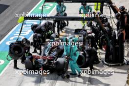 Lewis Hamilton (GBR) Mercedes AMG F1 W15 makes a pit stop. 21.07.2024. Formula 1 World Championship, Rd 13, Hungarian Grand Prix, Budapest, Hungary, Race Day.