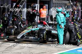 George Russell (GBR) Mercedes AMG F1 W15 makes a pit stop. 21.07.2024. Formula 1 World Championship, Rd 13, Hungarian Grand Prix, Budapest, Hungary, Race Day.