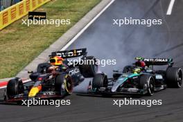 Lewis Hamilton (GBR) Mercedes AMG F1 W15 and Max Verstappen (NLD) Red Bull Racing RB20 collide. 21.07.2024. Formula 1 World Championship, Rd 13, Hungarian Grand Prix, Budapest, Hungary, Race Day.