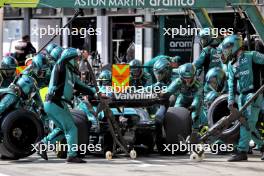 Fernando Alonso (ESP) Aston Martin F1 Team AMR24 makes a pit stop. 21.07.2024. Formula 1 World Championship, Rd 13, Hungarian Grand Prix, Budapest, Hungary, Race Day.