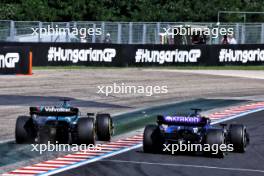 Lance Stroll (CDN) Aston Martin F1 Team AMR24 and Alexander Albon (THA) Williams Racing FW46 battle for position. 21.07.2024. Formula 1 World Championship, Rd 13, Hungarian Grand Prix, Budapest, Hungary, Race Day.
