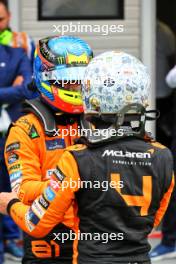 Lando Norris (GBR) McLaren celebrates his pole position in qualifying parc ferme with second placed team mate Oscar Piastri (AUS) McLaren. 20.07.2024. Formula 1 World Championship, Rd 13, Hungarian Grand Prix, Budapest, Hungary, Qualifying Day.