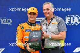 (L to R): Lando Norris (GBR) McLaren receives the Pirelli Pole Position Award from Mario Isola (ITA) Pirelli Racing Manager. 20.07.2024. Formula 1 World Championship, Rd 13, Hungarian Grand Prix, Budapest, Hungary, Qualifying Day.