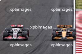 Kevin Magnussen (DEN) Haas VF-24 and Oscar Piastri (AUS) McLaren MCL38. 20.07.2024. Formula 1 World Championship, Rd 13, Hungarian Grand Prix, Budapest, Hungary, Qualifying Day.