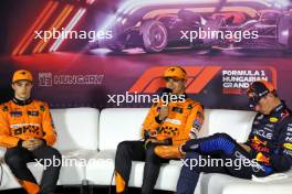 (L to R): Oscar Piastri (AUS) McLaren; Lando Norris (GBR) McLaren; and Max Verstappen (NLD) Red Bull Racing, in the post qualifying FIA Press Conference. 20.07.2024. Formula 1 World Championship, Rd 13, Hungarian Grand Prix, Budapest, Hungary, Qualifying Day.