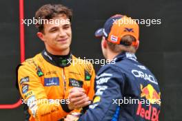 (L to R): Lando Norris (GBR) McLaren celebrates his pole position in qualifying parc ferme with third placed Max Verstappen (NLD) Red Bull Racing. 20.07.2024. Formula 1 World Championship, Rd 13, Hungarian Grand Prix, Budapest, Hungary, Qualifying Day.