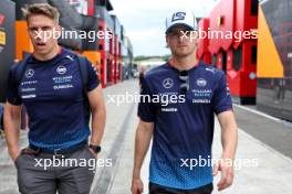 (L to R): Elias Huhtinen (FIN) Williams Racing Personal Trainer with Logan Sargeant (USA) Williams Racing. 20.07.2024. Formula 1 World Championship, Rd 13, Hungarian Grand Prix, Budapest, Hungary, Qualifying Day.