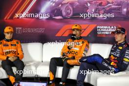 (L to R): Oscar Piastri (AUS) McLaren; Lando Norris (GBR) McLaren; and Max Verstappen (NLD) Red Bull Racing, in the post qualifying FIA Press Conference. 20.07.2024. Formula 1 World Championship, Rd 13, Hungarian Grand Prix, Budapest, Hungary, Qualifying Day.
