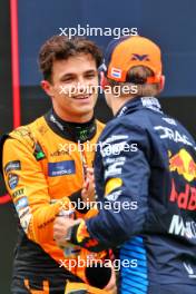 (L to R): Lando Norris (GBR) McLaren celebrates his pole position in qualifying parc ferme with third placed Max Verstappen (NLD) Red Bull Racing. 20.07.2024. Formula 1 World Championship, Rd 13, Hungarian Grand Prix, Budapest, Hungary, Qualifying Day.