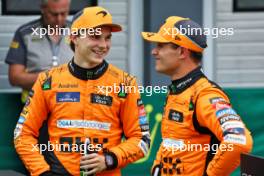 (L to R): Third placed Oscar Piastri (AUS) McLaren with pole sitter and team mate Lando Norris (GBR) McLaren in qualifying parc ferme. 20.07.2024. Formula 1 World Championship, Rd 13, Hungarian Grand Prix, Budapest, Hungary, Qualifying Day.