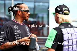 Lewis Hamilton (GBR) Mercedes AMG F1 with Valtteri Bottas (FIN) Sauber on the drivers' parade. 21.07.2024. Formula 1 World Championship, Rd 13, Hungarian Grand Prix, Budapest, Hungary, Race Day.