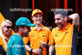 (L to R): Sophie Ogg (GBR) McLaren Communications Director; Fernando Alonso (ESP) Aston Martin F1 Team; Oscar Piastri (AUS) McLaren; and Andrea Stella (ITA) McLaren Team Principal. 18.07.2024. Formula 1 World Championship, Rd 13, Hungarian Grand Prix, Budapest, Hungary, Preparation Day.