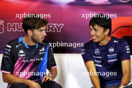 (L to R): Pierre Gasly (FRA) Alpine F1 Team and Alexander Albon (THA) Williams Racing in the FIA Press Conference. 18.07.2024. Formula 1 World Championship, Rd 13, Hungarian Grand Prix, Budapest, Hungary, Preparation Day.
