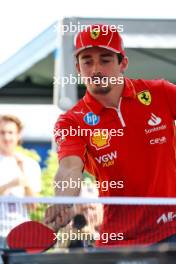 Charles Leclerc (MON) Ferrari plays table tennis in the paddock. 18.07.2024. Formula 1 World Championship, Rd 13, Hungarian Grand Prix, Budapest, Hungary, Preparation Day.