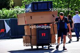 Red Bull Racing mechanic with a delivery in the paddock. 17.05.2024. Formula 1 World Championship, Rd 7, Emilia Romagna Grand Prix, Imola, Italy, Practice Day.