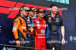 The podium (L to R): Lando Norris (GBR) McLaren, second; Max Verstappen (NLD) Red Bull Racing, race winner; Charles Leclerc (MON) Ferrari, third; David Morgan (GBR) Red Bull Racing Aero Trackside Performance Team Leader. 19.05.2024. Formula 1 World Championship, Rd 7, Emilia Romagna Grand Prix, Imola, Italy, Race Day.