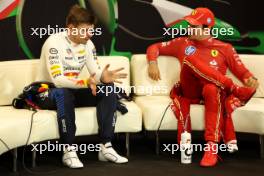 (L to R): Max Verstappen (NLD) Red Bull Racing; and Charles Leclerc (MON) Ferrari, in the post race FIA Press Conference. 19.05.2024. Formula 1 World Championship, Rd 7, Emilia Romagna Grand Prix, Imola, Italy, Race Day.