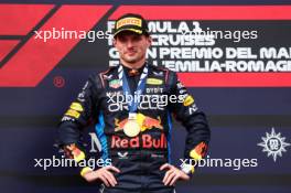 Race winner Max Verstappen (NLD) Red Bull Racing celebrates on the podium. 19.05.2024. Formula 1 World Championship, Rd 7, Emilia Romagna Grand Prix, Imola, Italy, Race Day.