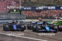 (L to R): Alexander Albon (THA) Williams Racing FW46 and Esteban Ocon (FRA) Alpine F1 Team A524 at the start of the race. 19.05.2024. Formula 1 World Championship, Rd 7, Emilia Romagna Grand Prix, Imola, Italy, Race Day.