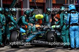 Lance Stroll (CDN) Aston Martin F1 Team AMR24 makes a pit stop. 19.05.2024. Formula 1 World Championship, Rd 7, Emilia Romagna Grand Prix, Imola, Italy, Race Day.