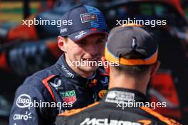 Pole sitter Max Verstappen (NLD) Red Bull Racing in qualifying parc ferme with Lando Norris (GBR) McLaren. 18.05.2024. Formula 1 World Championship, Rd 7, Emilia Romagna Grand Prix, Imola, Italy, Qualifying Day.