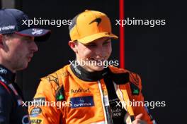 Oscar Piastri (AUS) McLaren with pole sitter Max Verstappen (NLD) Red Bull Racing in qualifying parc ferme. 18.05.2024. Formula 1 World Championship, Rd 7, Emilia Romagna Grand Prix, Imola, Italy, Qualifying Day.