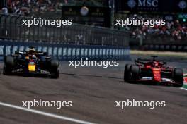 (L to R): Max Verstappen (NLD) Red Bull Racing RB20 and Charles Leclerc (MON) Ferrari SF-24. 18.05.2024. Formula 1 World Championship, Rd 7, Emilia Romagna Grand Prix, Imola, Italy, Qualifying Day.