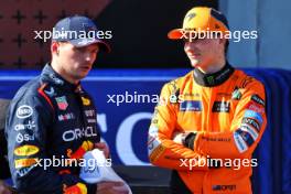 (L to R): Pole sitter Max Verstappen (NLD) Red Bull Racing in qualifying parc ferme with second placed Oscar Piastri (AUS) McLaren. 18.05.2024. Formula 1 World Championship, Rd 7, Emilia Romagna Grand Prix, Imola, Italy, Qualifying Day.