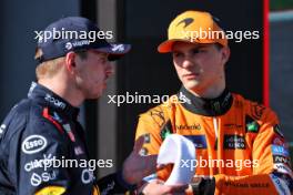 (L to R): Pole sitter Max Verstappen (NLD) Red Bull Racing in qualifying parc ferme with Oscar Piastri (AUS) McLaren. 18.05.2024. Formula 1 World Championship, Rd 7, Emilia Romagna Grand Prix, Imola, Italy, Qualifying Day.