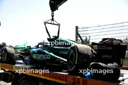 The Aston Martin F1 Team AMR24 of Fernando Alonso (ESP) is recovered back to the pits on the back of a truck after he crashed in the third practice session. 18.05.2024. Formula 1 World Championship, Rd 7, Emilia Romagna Grand Prix, Imola, Italy, Qualifying Day.