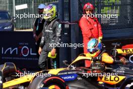Lewis Hamilton (GBR) Mercedes AMG F1 and Oscar Piastri (AUS) McLaren MCL38 in qualifying parc ferme. 18.05.2024. Formula 1 World Championship, Rd 7, Emilia Romagna Grand Prix, Imola, Italy, Qualifying Day.