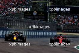 (L to R): Max Verstappen (NLD) Red Bull Racing RB20 and Charles Leclerc (MON) Ferrari SF-24. 18.05.2024. Formula 1 World Championship, Rd 7, Emilia Romagna Grand Prix, Imola, Italy, Qualifying Day.