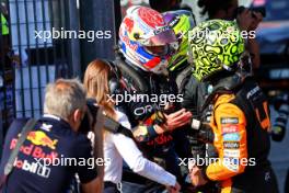 (L to R): Max Verstappen (NLD) Red Bull Racing celebrates his pole position with third placed Lando Norris (GBR) McLaren in qualifying parc ferme. 18.05.2024. Formula 1 World Championship, Rd 7, Emilia Romagna Grand Prix, Imola, Italy, Qualifying Day.