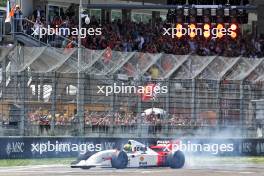 Sebastian Vettel (GER) in a 1993 McLaren MP4/8. 19.05.2024. Formula 1 World Championship, Rd 7, Emilia Romagna Grand Prix, Imola, Italy, Race Day.