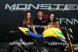 (L to R): Bianca Senna (BRA) Senna Brands CEO; Francesco Bagnaia (ITA) Ducati MotoGP Rider; and Paula Senna Lalli (BRA) - Ducati Monster Senna motorbike. 16.05.2024. Formula 1 World Championship, Rd 7, Emilia Romagna Grand Prix, Imola, Italy, Preparation Day.