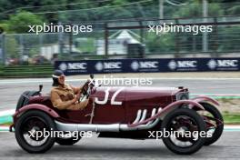 George Russell (GBR) Mercedes AMG F1 in vintage race overalls in a 1924 Targa Florio Mercedes racing car. 16.05.2024. Formula 1 World Championship, Rd 7, Emilia Romagna Grand Prix, Imola, Italy, Preparation Day.