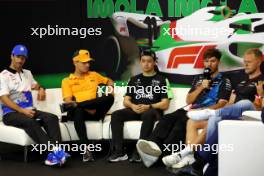(L to R): Daniel Ricciardo (AUS) RB; Lando Norris (GBR) McLaren; Zhou Guanyu (CHN) Sauber; Pierre Gasly (FRA) Alpine F1 Team; Kevin Magnussen (DEN) Haas F1 Team; and Carlos Sainz Jr (ESP) Ferrari, in the FIA Press Conference. 16.05.2024. Formula 1 World Championship, Rd 7, Emilia Romagna Grand Prix, Imola, Italy, Preparation Day.