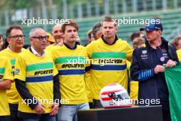 (L to R): Stefano Domenicali (ITA) Formula One President and CEO; Logan Sargeant (USA) Williams Racing; Nico Hulkenberg (GER) Haas F1 Team; and Max Verstappen (NLD) Red Bull Racing - tribute run for Ayrton Senna and Roland Ratzenberger. 16.05.2024. Formula 1 World Championship, Rd 7, Emilia Romagna Grand Prix, Imola, Italy, Preparation Day.